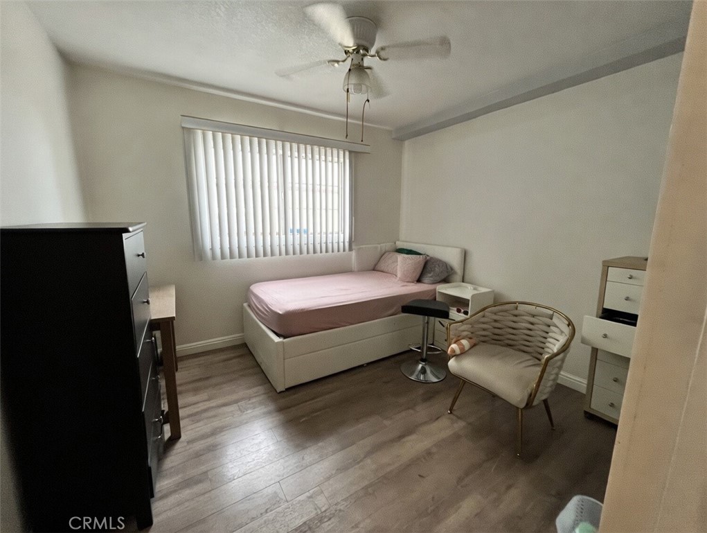 12188 Oracle Street Norwalk, CA 90650 - Photo 12 of 29 a bedroom with bed and window