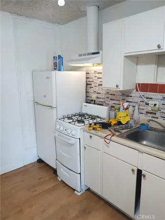 a utility room with washer and dryer