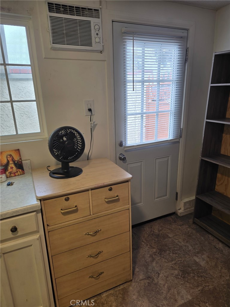 12188 Oracle Street Norwalk, CA 90650 - Photo 26 of 29 a kitchen with a stove and cabinets
