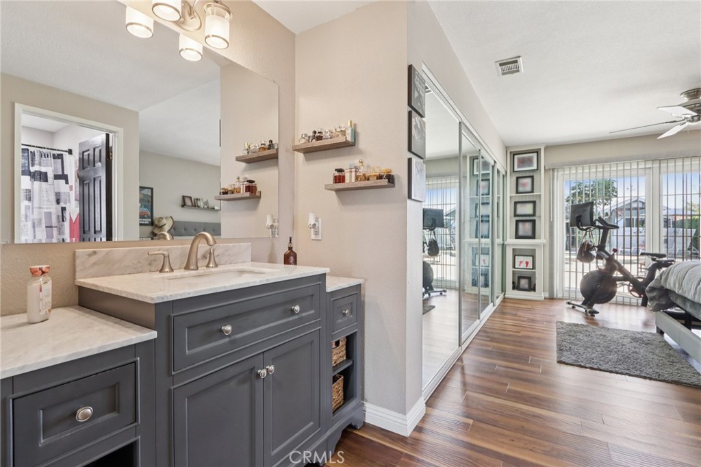 1250 Blazewood Street Riverside, CA 92507 - Photo 13 of 29 a spacious bathroom with a granite countertop sink mirror and a shower