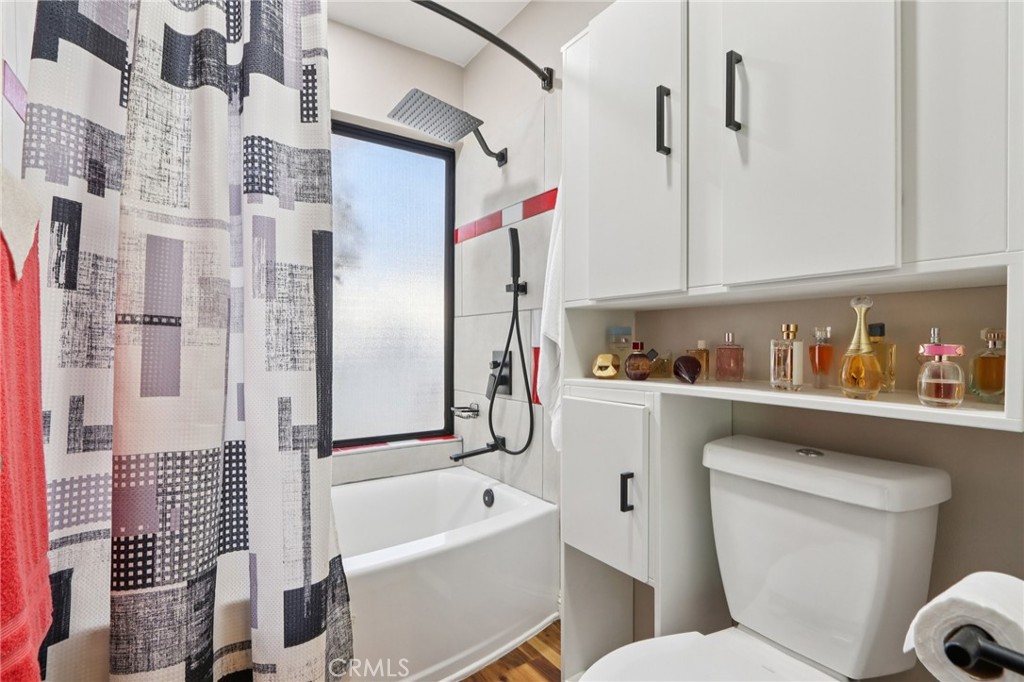 1250 Blazewood Street Riverside, CA 92507 - Photo 14 of 29 a bathroom with a toilet sink and shower