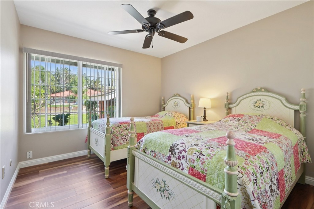 1250 Blazewood Street Riverside, CA 92507 - Photo 15 of 29 a bedroom with a bed and a large window