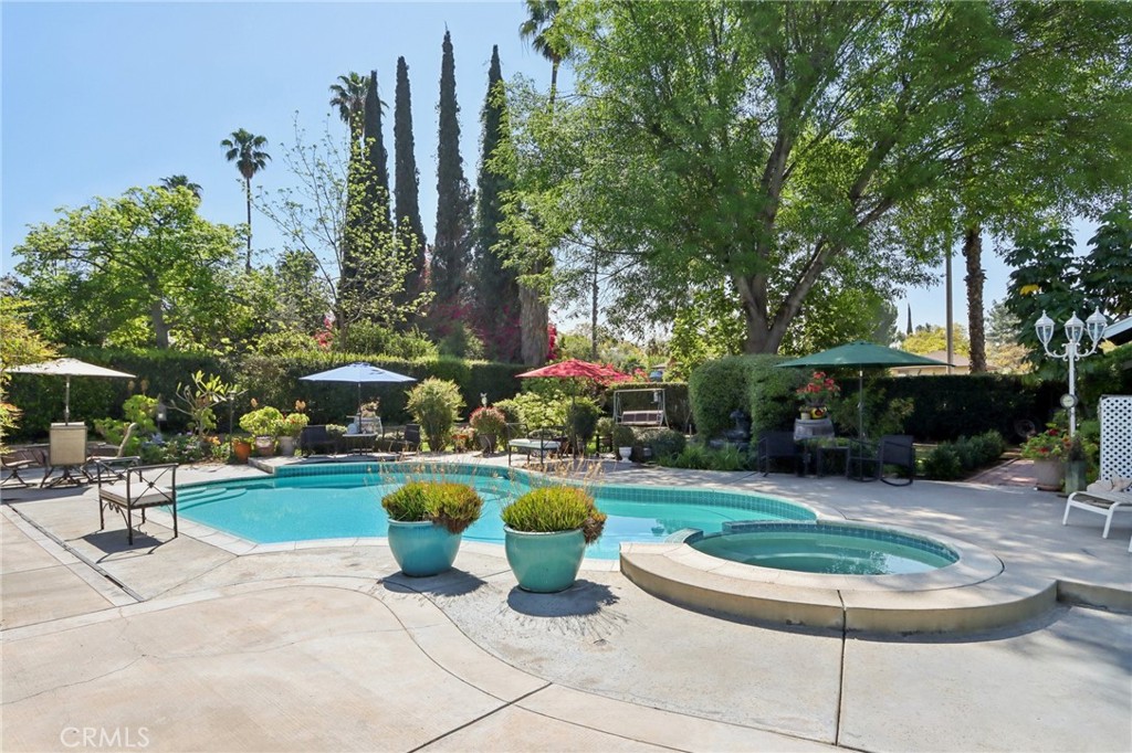 1250 Blazewood Street Riverside, CA 92507 - Photo 24 of 29 a view of a chair and table in backyard with plants