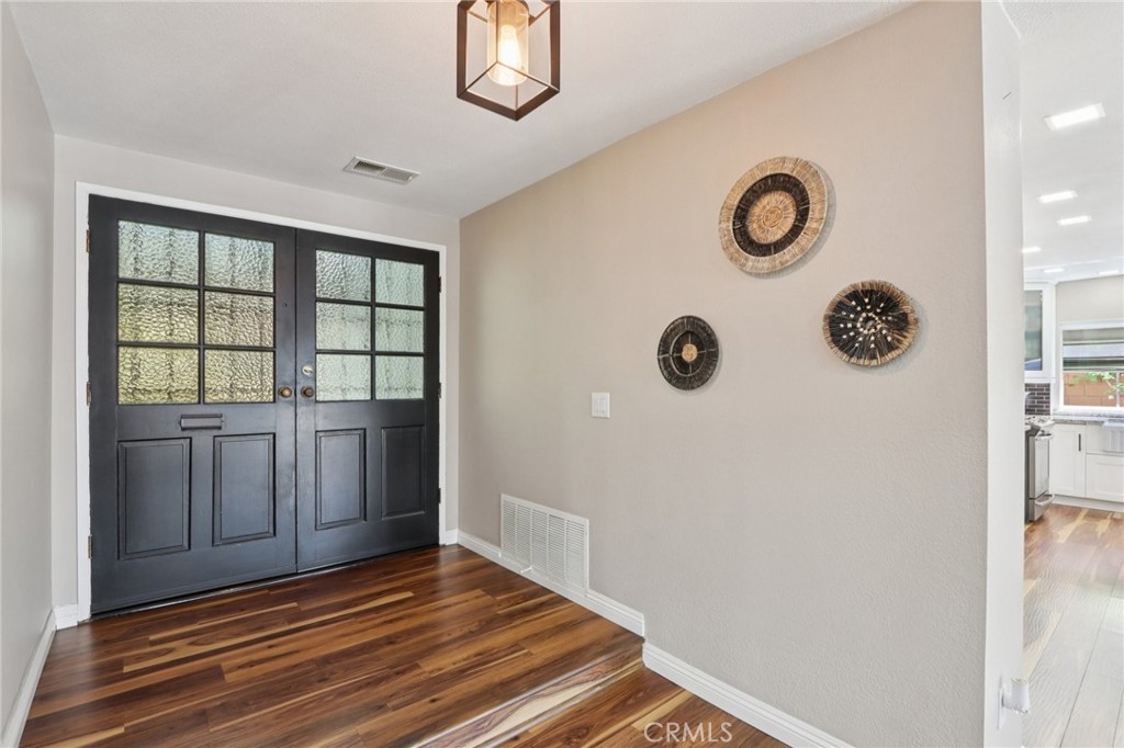 1250 Blazewood Street Riverside, CA 92507 - Photo 4 of 29 a view of a livingroom with wooden floor
