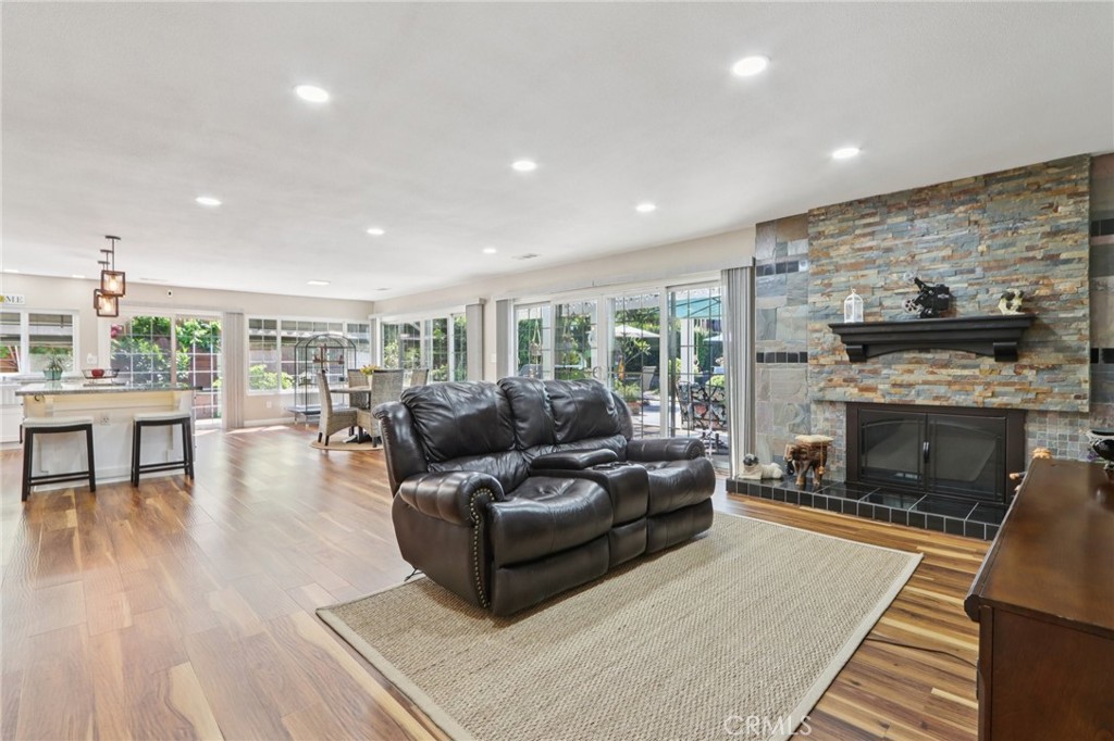 1250 Blazewood Street Riverside, CA 92507 - Photo 5 of 29 a living room with furniture and a fireplace