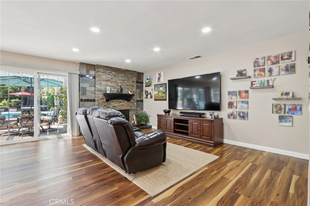 1250 Blazewood Street Riverside, CA 92507 - Photo 6 of 29 a living room with furniture and a flat screen tv