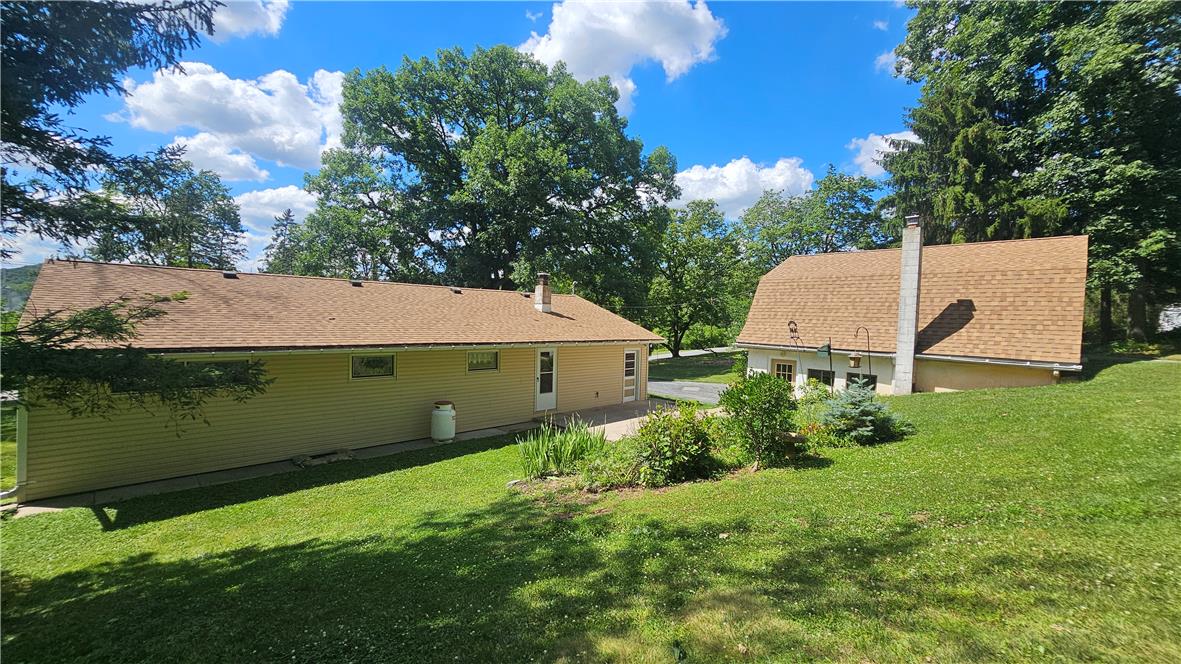 2529 Ringhoffer Road Hellertown, PA 18055 - Photo 18 of 33 Two charming residences, nestled among mature trees, offer a serene retreat.