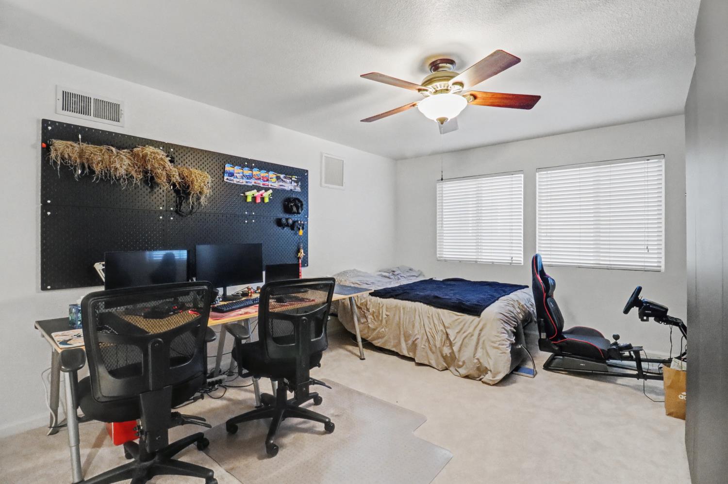 10056 Wexted Way Elk Grove, CA 95757 - Photo 25 of 39 a bedroom with bed and a window
