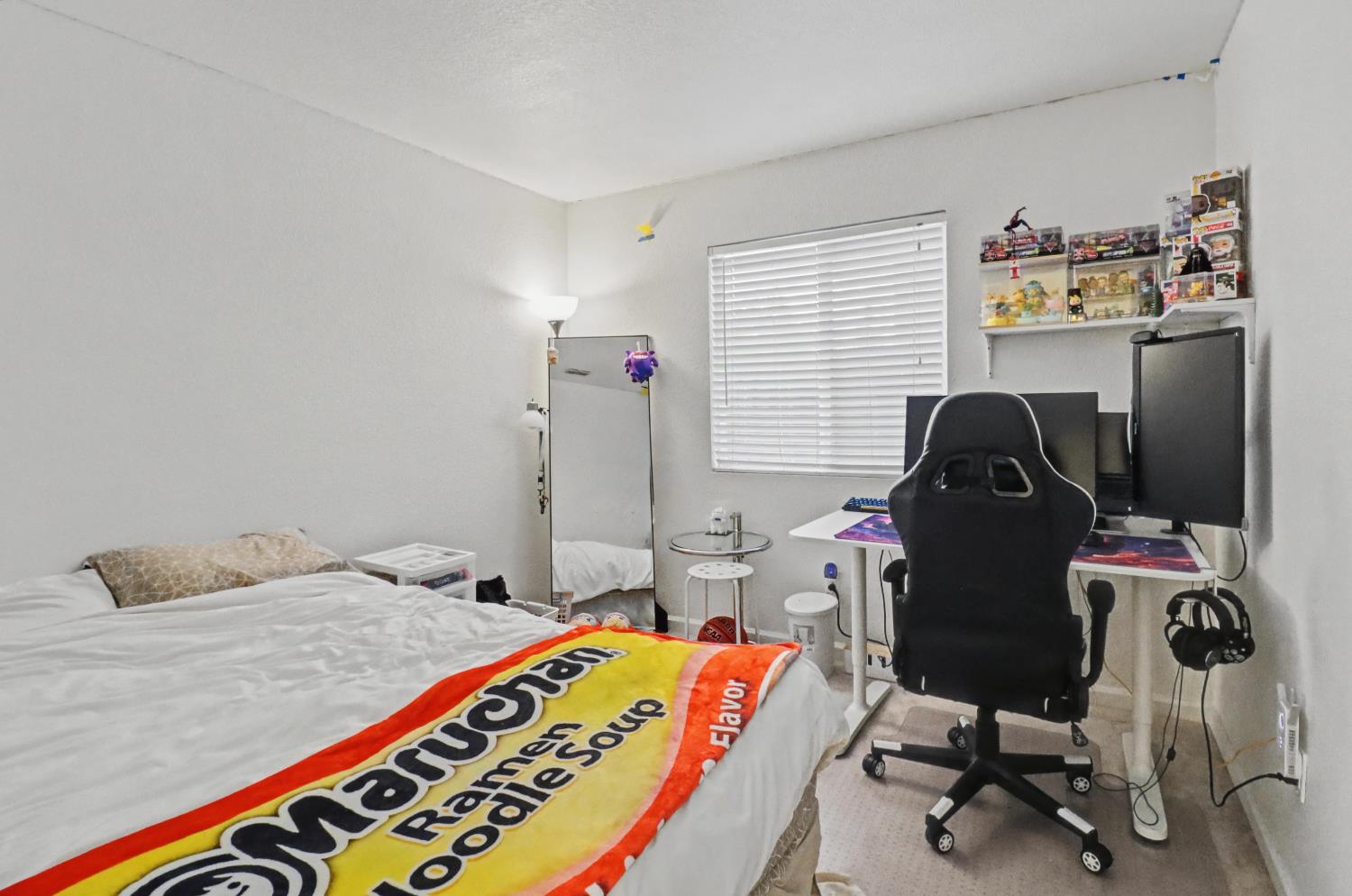 10056 Wexted Way Elk Grove, CA 95757 - Photo 28 of 39 a bedroom with a workspace
