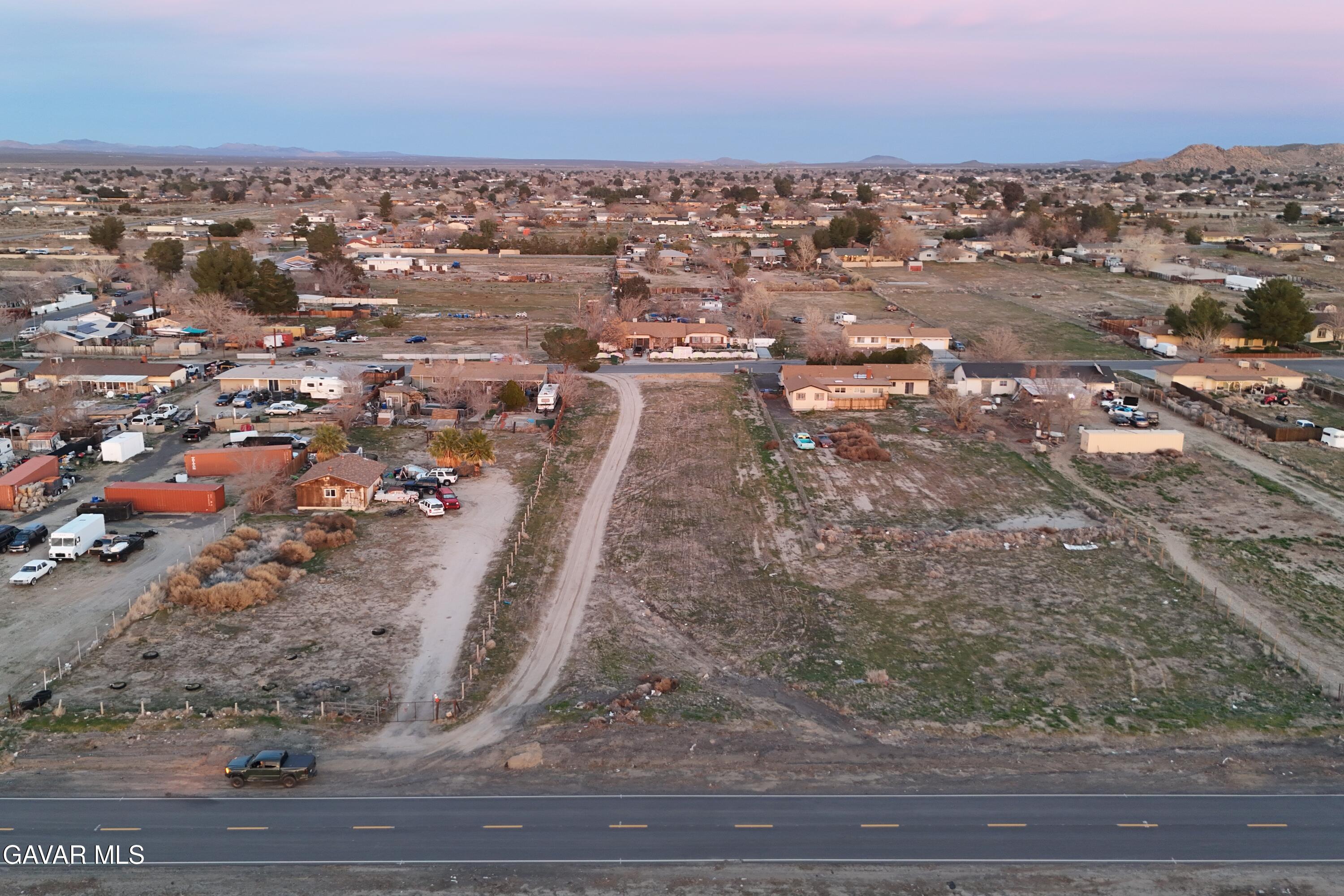156th Street East Lancaster, CA 93535 - Photo 5 of 14 an aerial view of house with yard