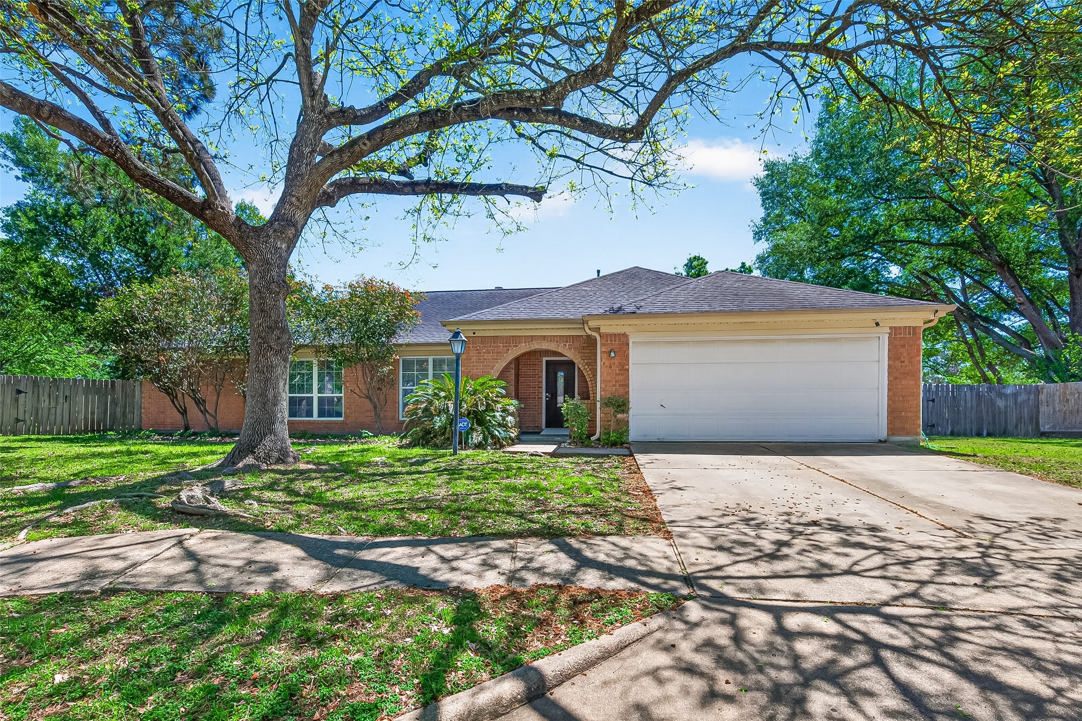 3506 Doherty Place Katy, TX 77449 - Photo 1 of 50 a front view of a house with a yard and garage