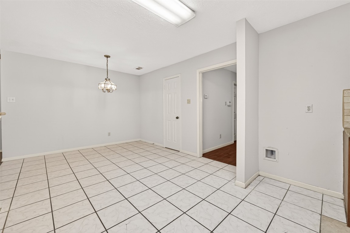 3506 Doherty Place Katy, TX 77449 - Photo 20 of 50 a view of an empty room and chandelier fan