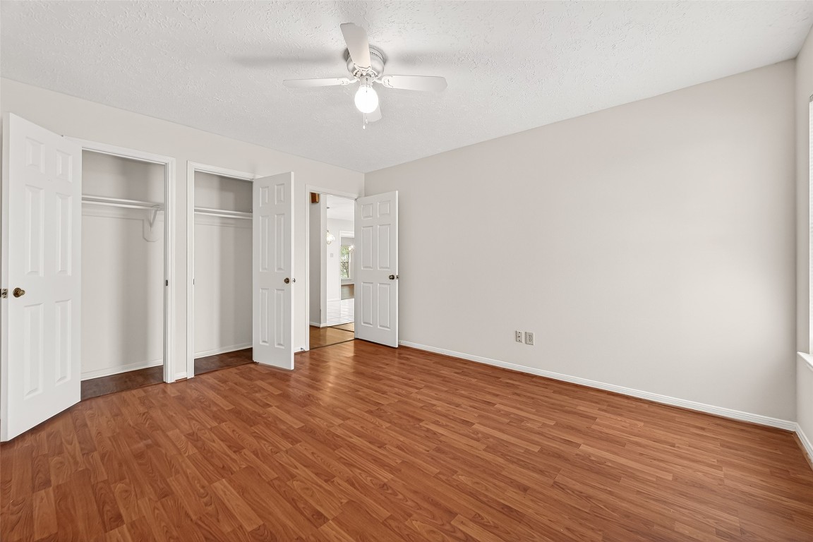 3506 Doherty Place Katy, TX 77449 - Photo 32 of 50 a view of an empty room with wooden floor