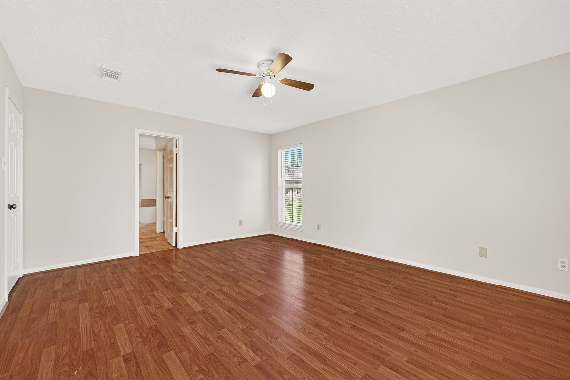 3506 Doherty Place Katy, TX 77449 - Photo 37 of 50 a view of empty room with wooden floor