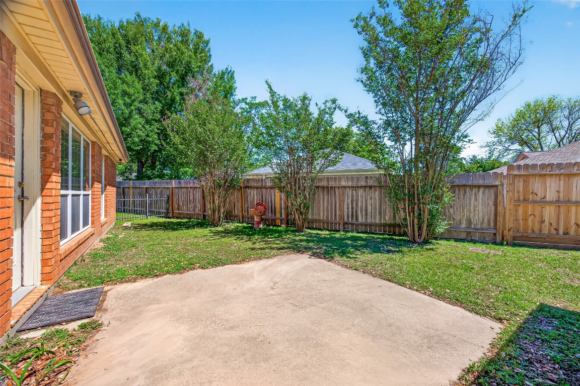 3506 Doherty Place Katy, TX 77449 - Photo 47 of 50 a view of a house with a yard and a garden
