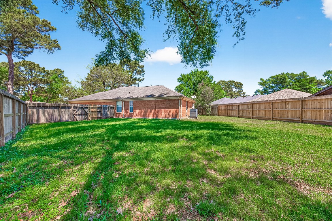 3506 Doherty Place Katy, TX 77449 - Photo 49 of 50 a view of house with backyard space