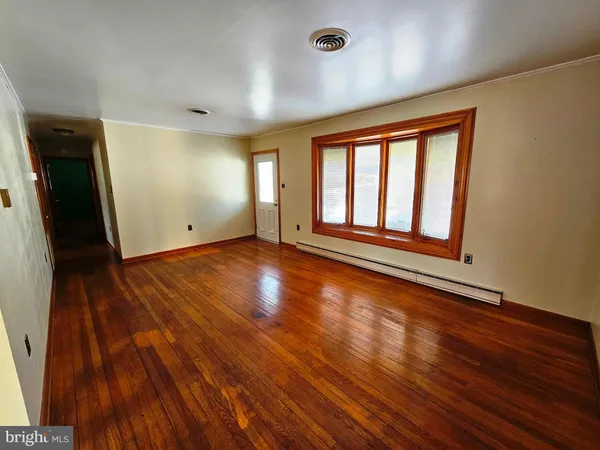 a view of an empty room with window