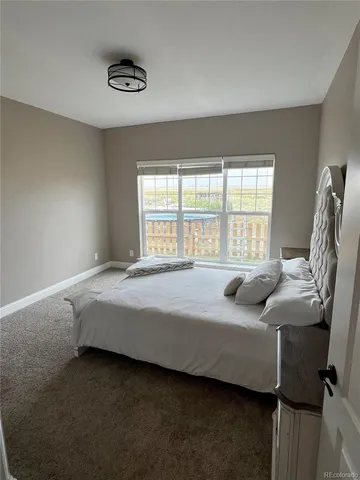 a spacious bathroom with a bathtub and a shower