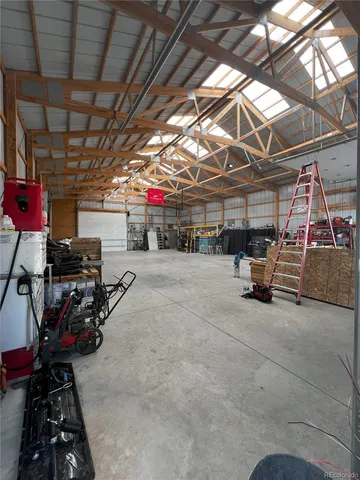 an aerial view of a house with a ocean view