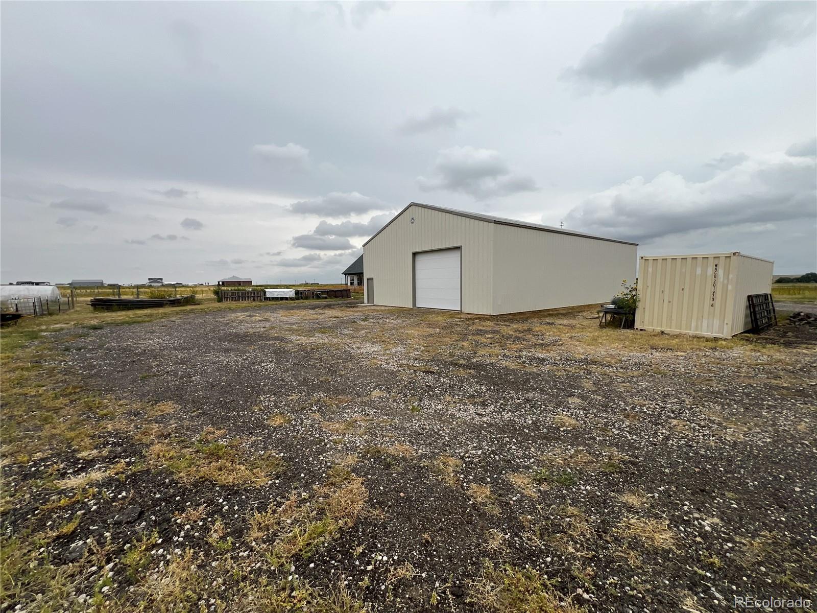 6945 Strasburg Road Strasburg, CO 80136 - Photo 7 of 42 a view of an ocean and beach