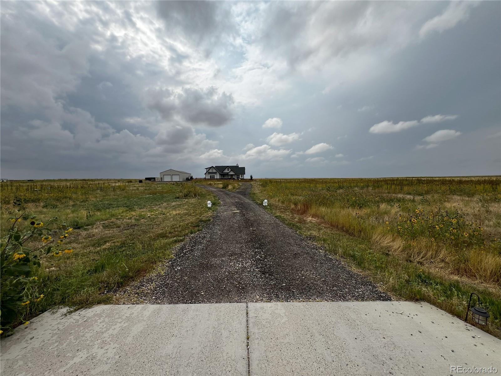 6945 Strasburg Road Strasburg, CO 80136 - Photo 8 of 42 a view of an ocean beach