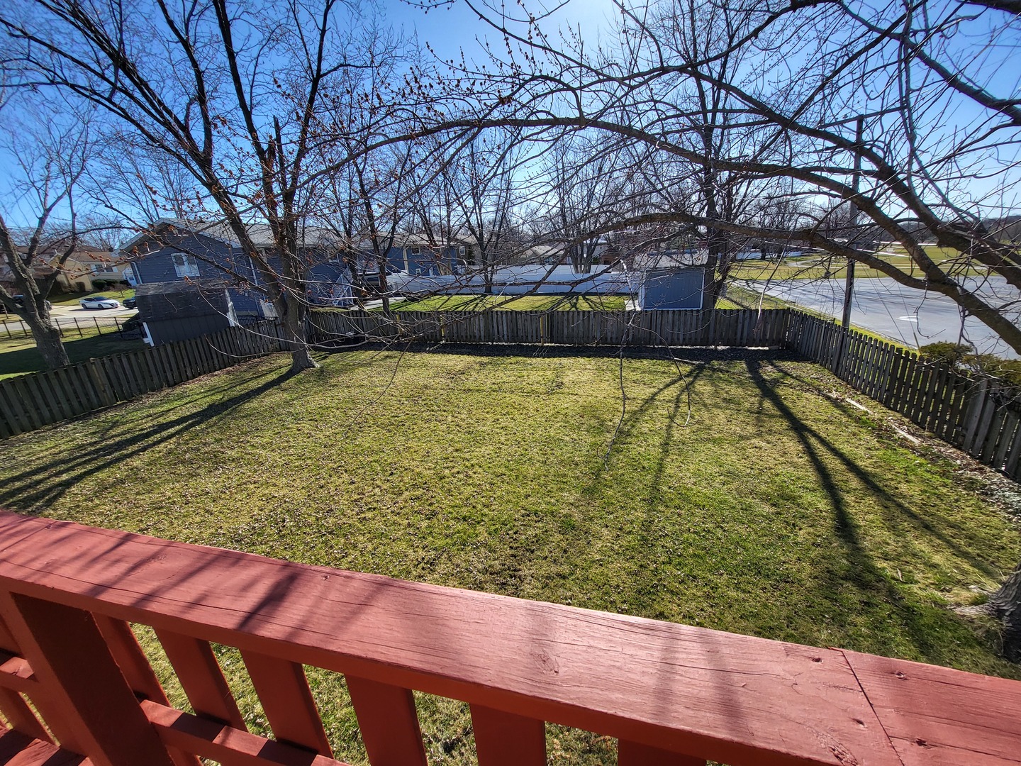 1770 Chippendale Road Hoffman Estates, IL 60169 - Photo 12 of 25 a view of a yard with wooden fence
