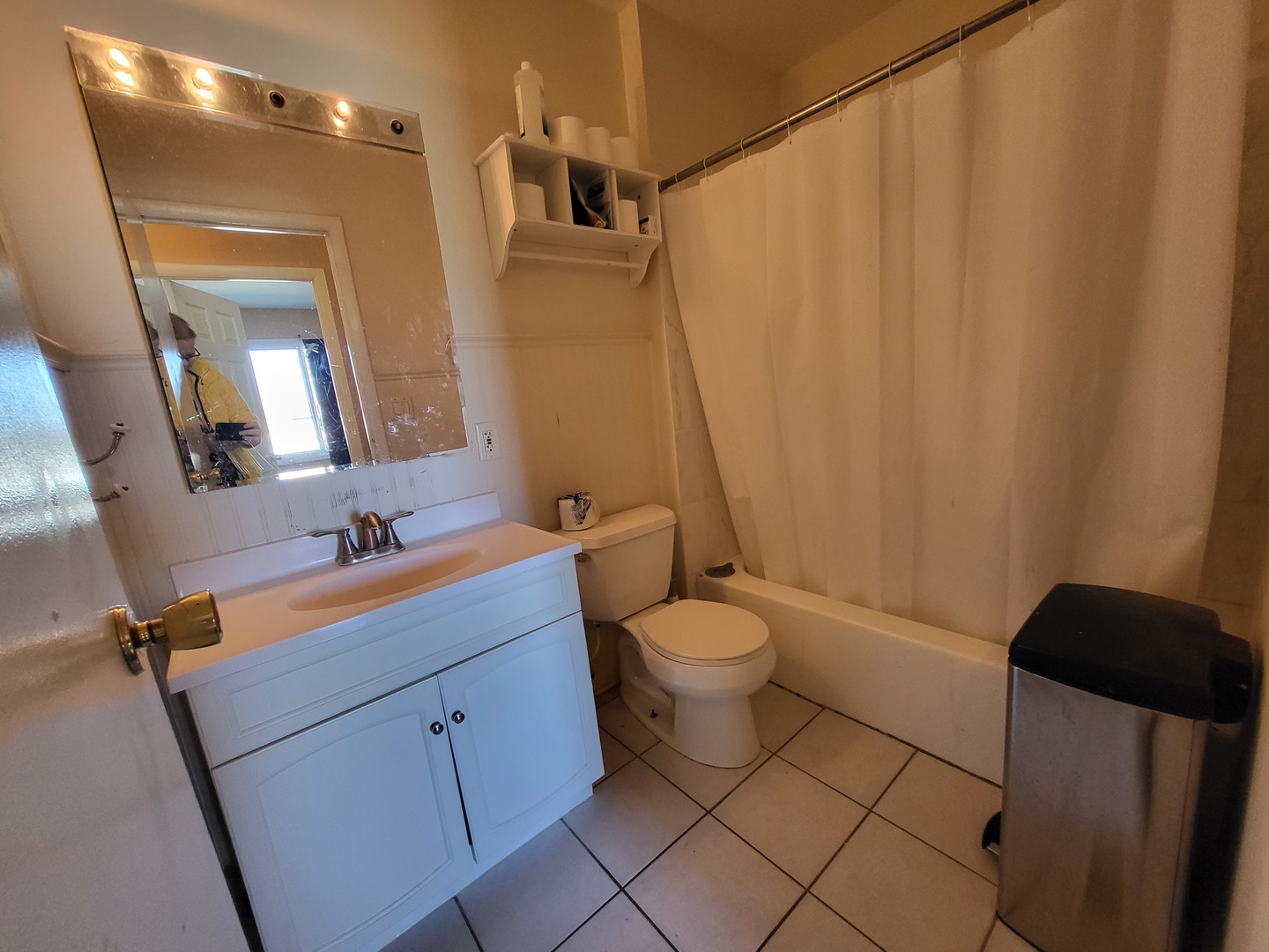 1770 Chippendale Road Hoffman Estates, IL 60169 - Photo 6 of 25 a bathroom with a toilet sink and mirror