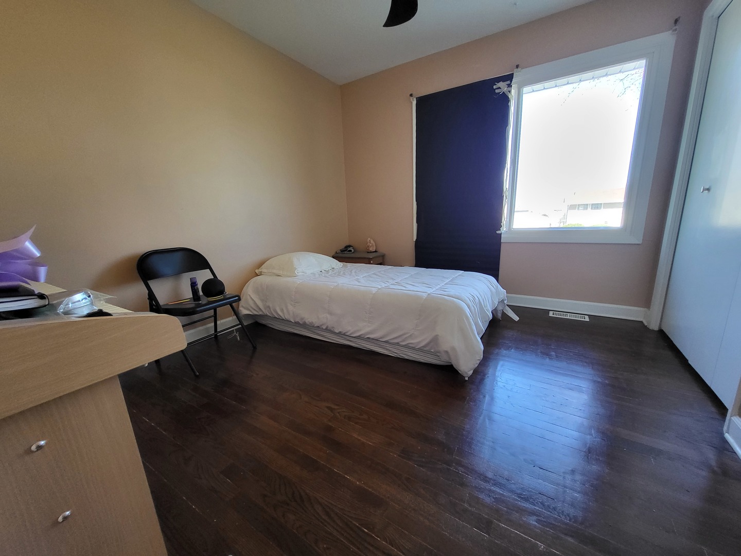 1770 Chippendale Road Hoffman Estates, IL 60169 - Photo 7 of 25 a bedroom with a bed and a window