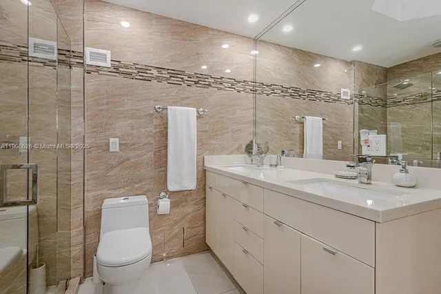 a bathroom with a sink and a shower