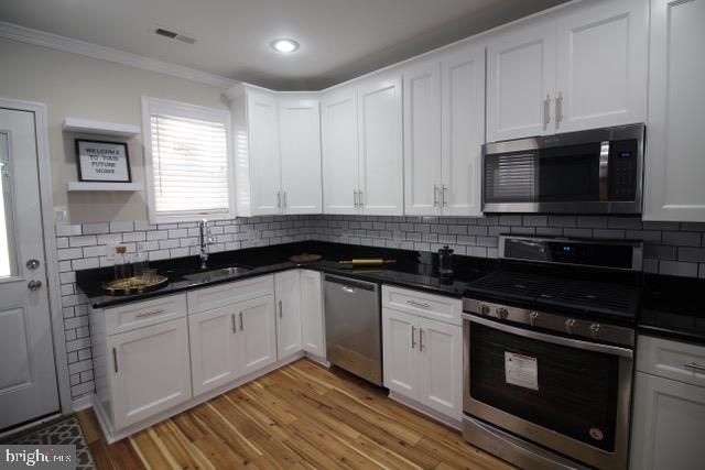 2103 Tasker Street Philadelphia, PA 19145 - Photo 6 of 17 Finished Basement
