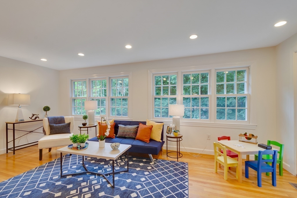 24 Beaver Pond Road Lincoln, MA 01773 - Photo 12 of 35 a living room with furniture and a window