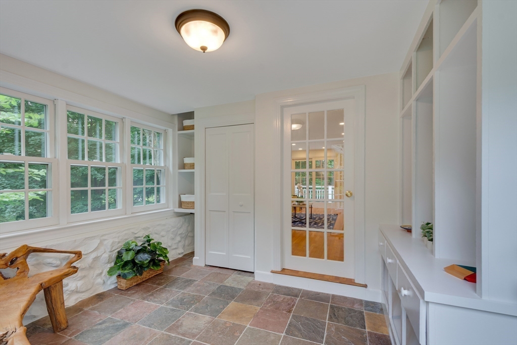 24 Beaver Pond Road Lincoln, MA 01773 - Photo 27 of 35 a view of an entryway with wooden floor and a window