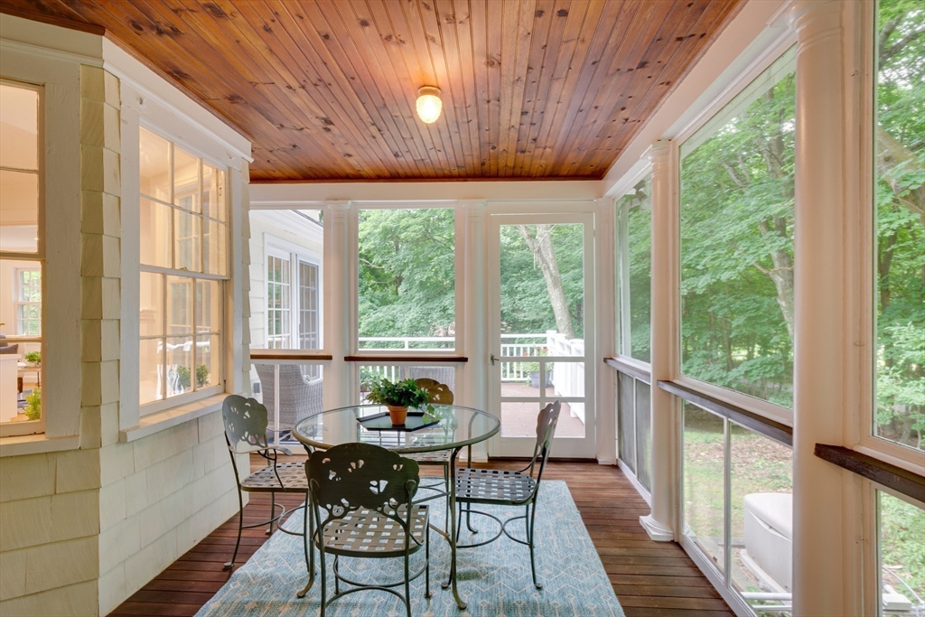 24 Beaver Pond Road Lincoln, MA 01773 - Photo 28 of 35 a view of a dining room with furniture window and outside view