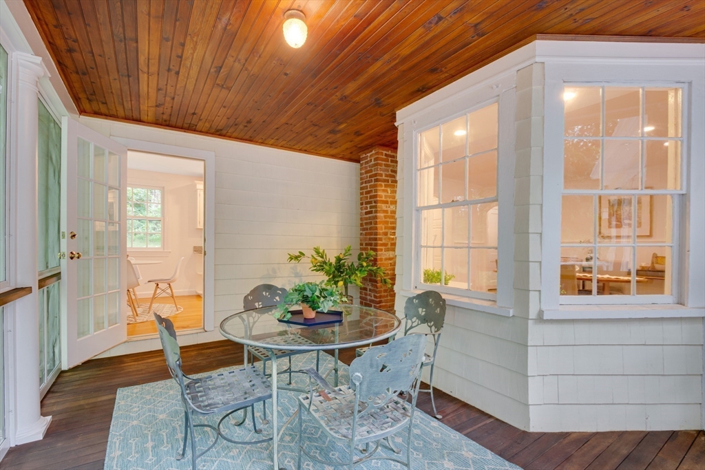 24 Beaver Pond Road Lincoln, MA 01773 - Photo 29 of 35 a dining room with furniture and window