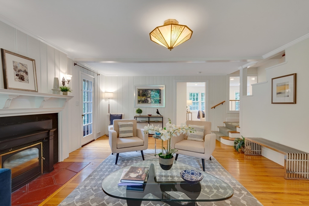 24 Beaver Pond Road Lincoln, MA 01773 - Photo 7 of 35 a living room with furniture and a fireplace