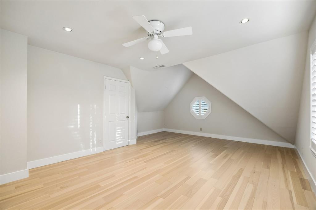 4115 Rive Lane Addison, TX 75001 - Photo 17 of 25 Spacious room featuring light wood-finish flooring, recessed lighting, and a ceiling fan