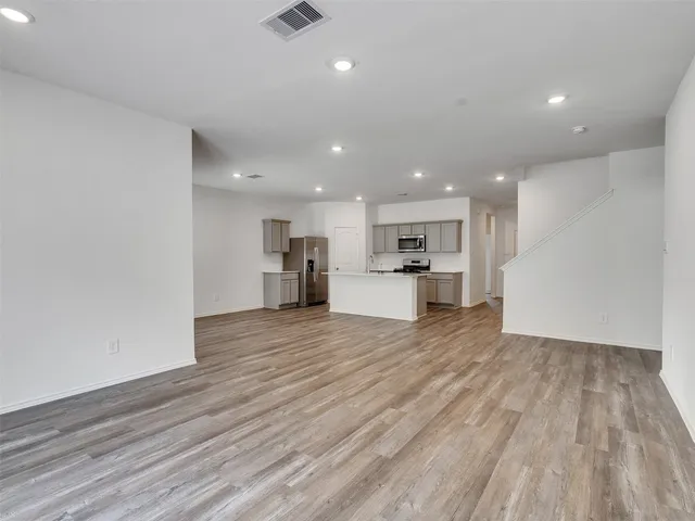 a view of kitchen dining space with wooden floor