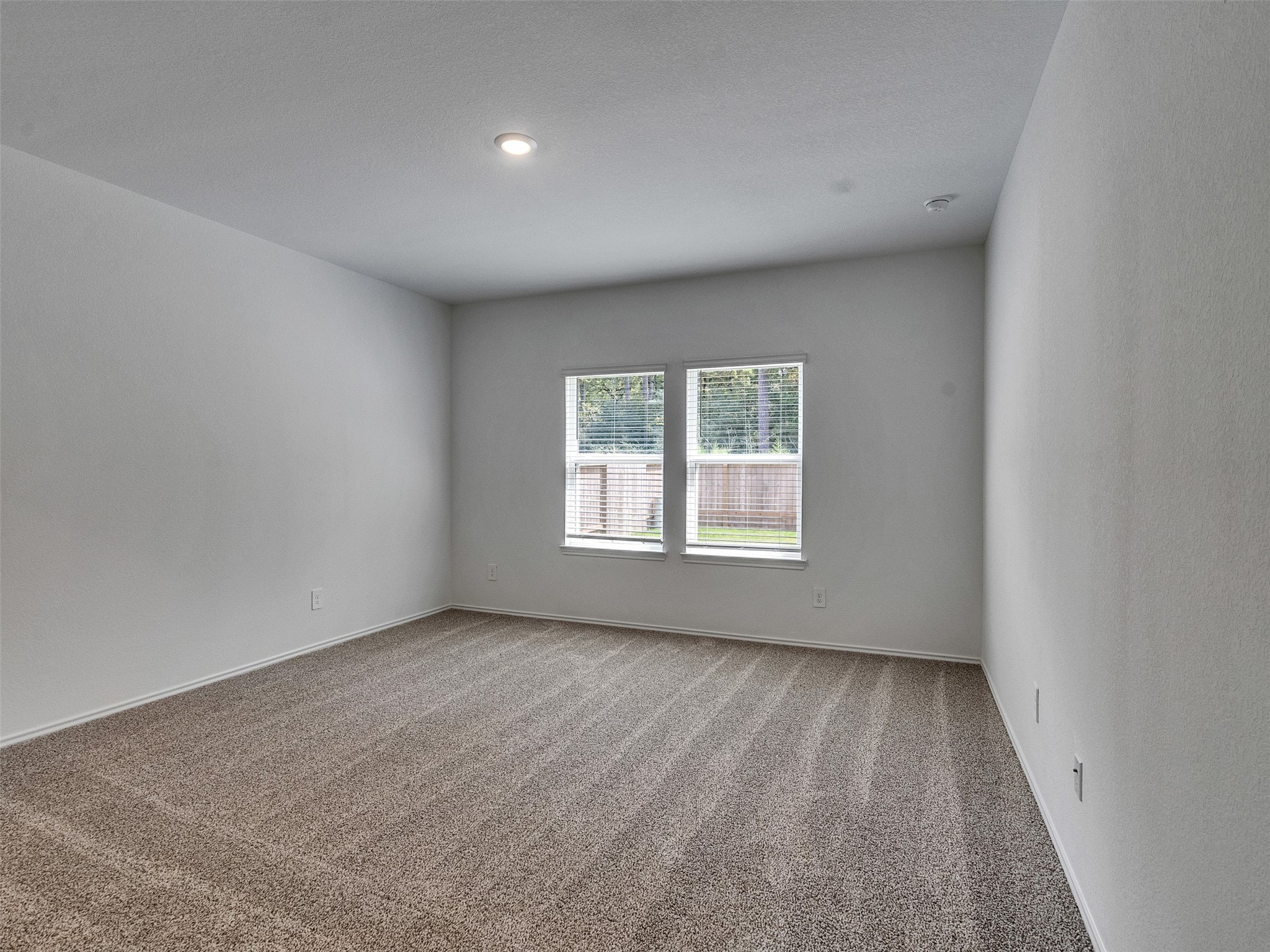 24863 Springbluff Valley Magnolia, TX 77355 - Photo 14 of 25 an empty room with a window