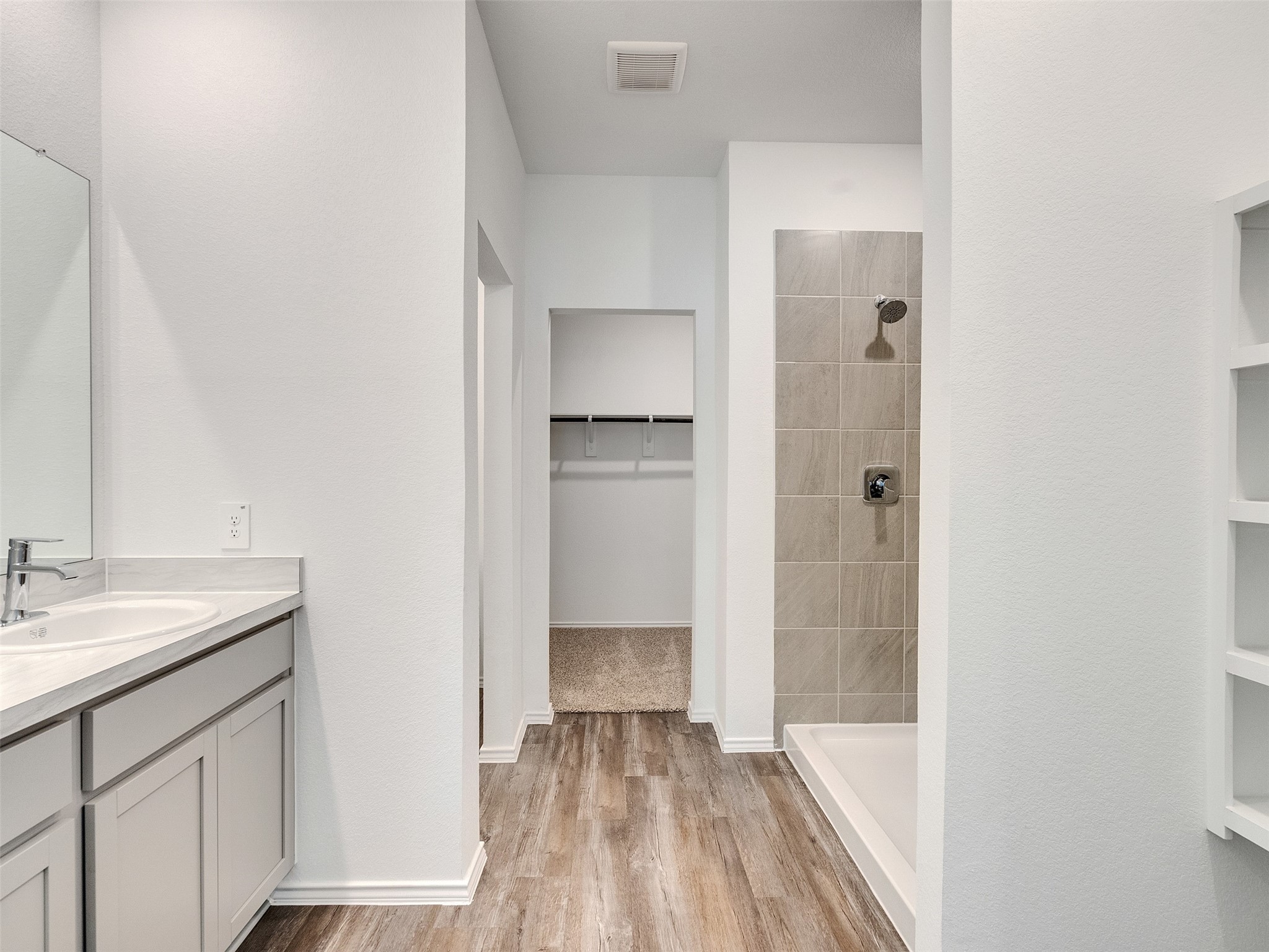 24863 Springbluff Valley Magnolia, TX 77355 - Photo 16 of 25 a bathroom with a sink and a mirror