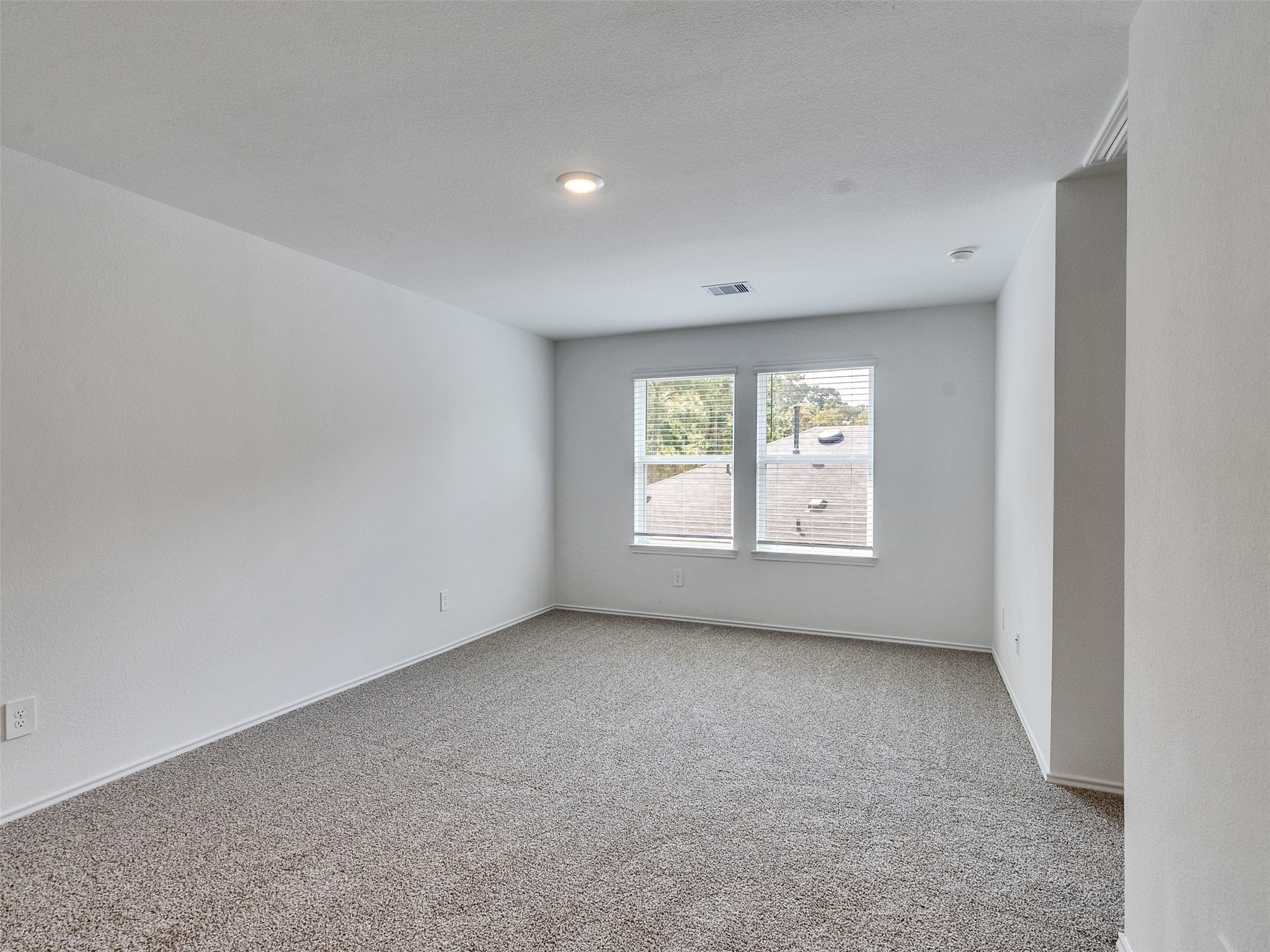 24863 Springbluff Valley Magnolia, TX 77355 - Photo 18 of 25 an empty room with a window