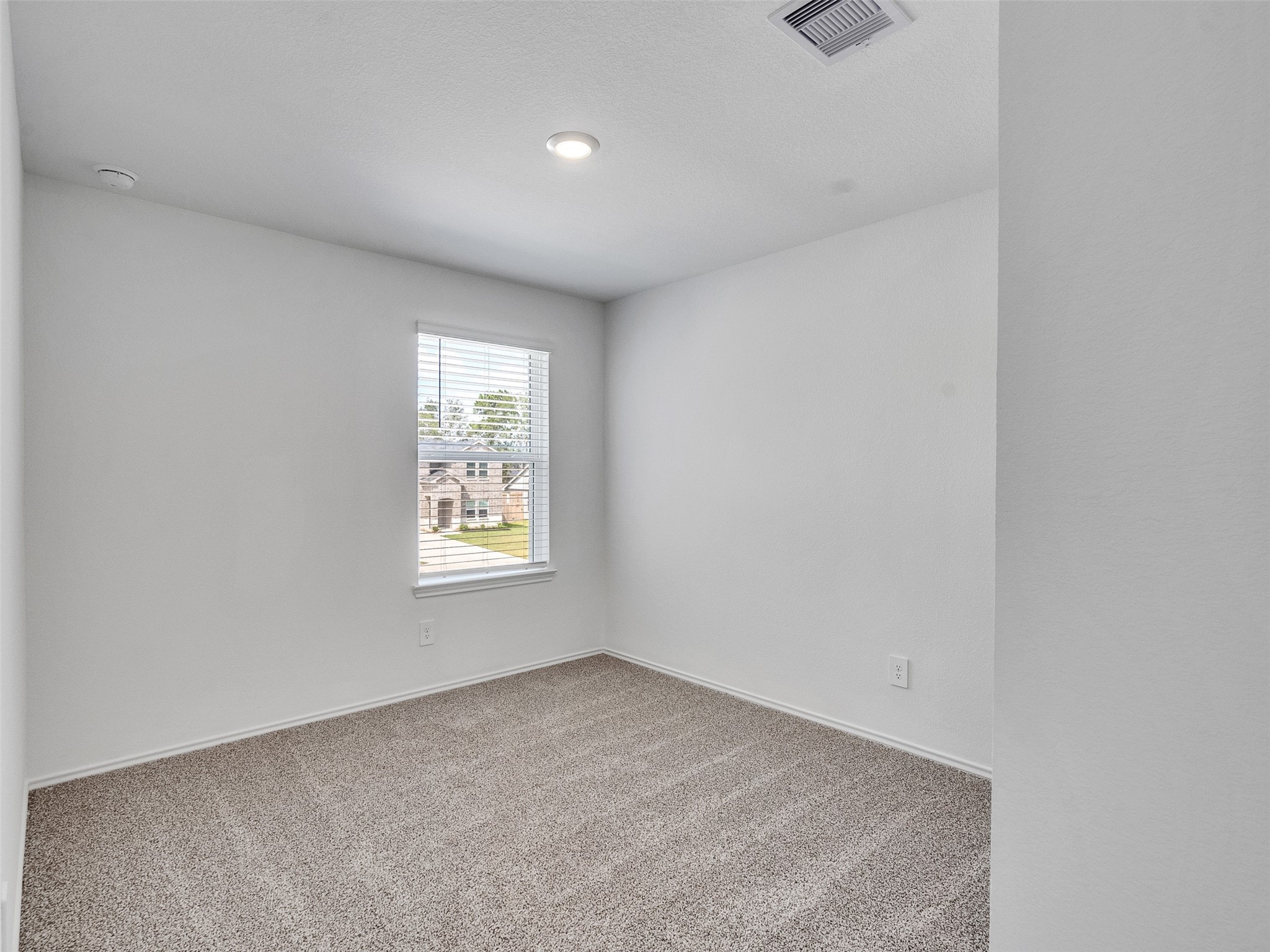 24863 Springbluff Valley Magnolia, TX 77355 - Photo 20 of 25 a view of an empty room with a window