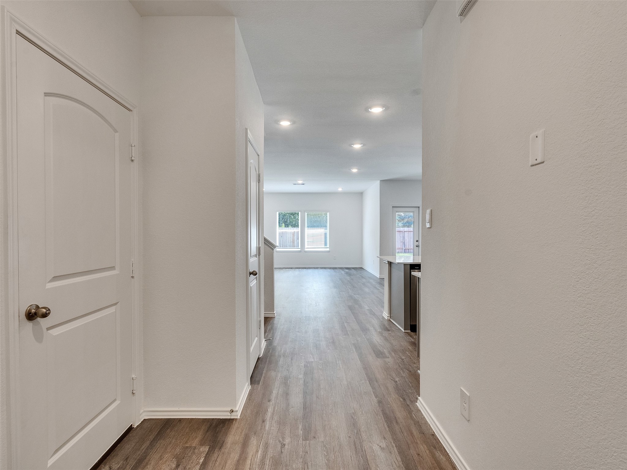 24863 Springbluff Valley Magnolia, TX 77355 - Photo 2 of 25 a view of hallway with wooden floor