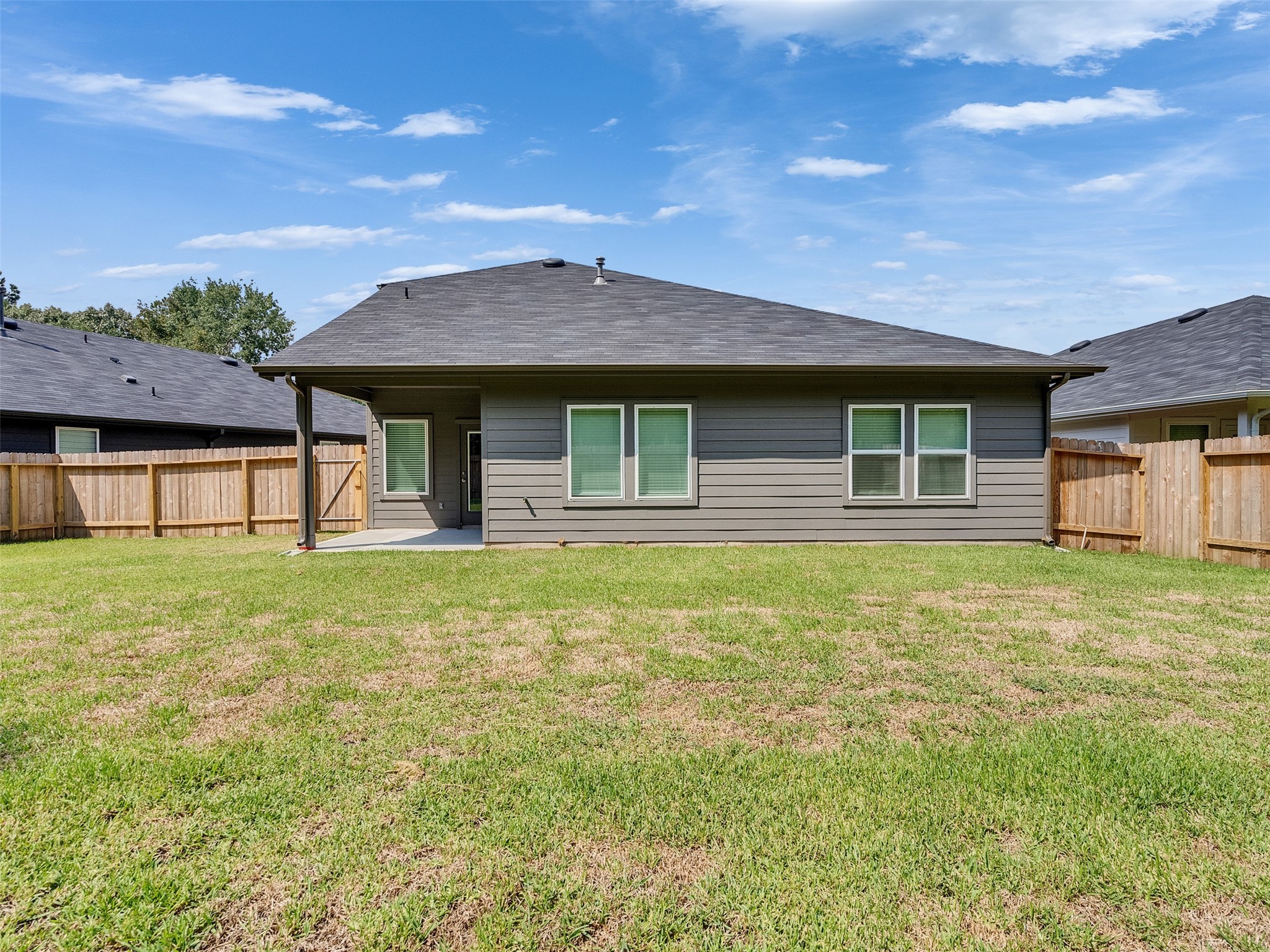 24863 Springbluff Valley Magnolia, TX 77355 - Photo 21 of 25 a front view of a house with a garden