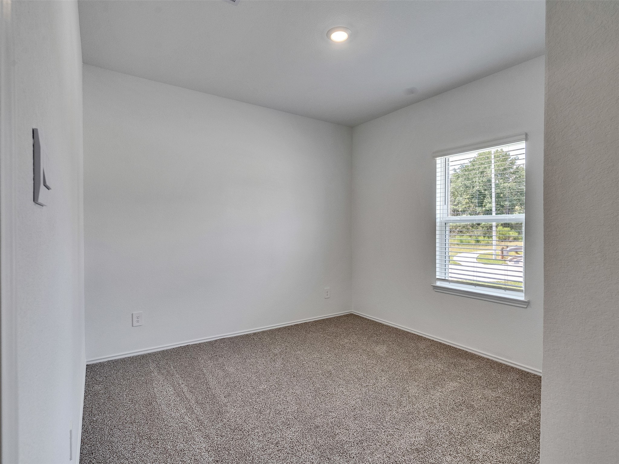 24863 Springbluff Valley Magnolia, TX 77355 - Photo 3 of 25 an empty room with a window