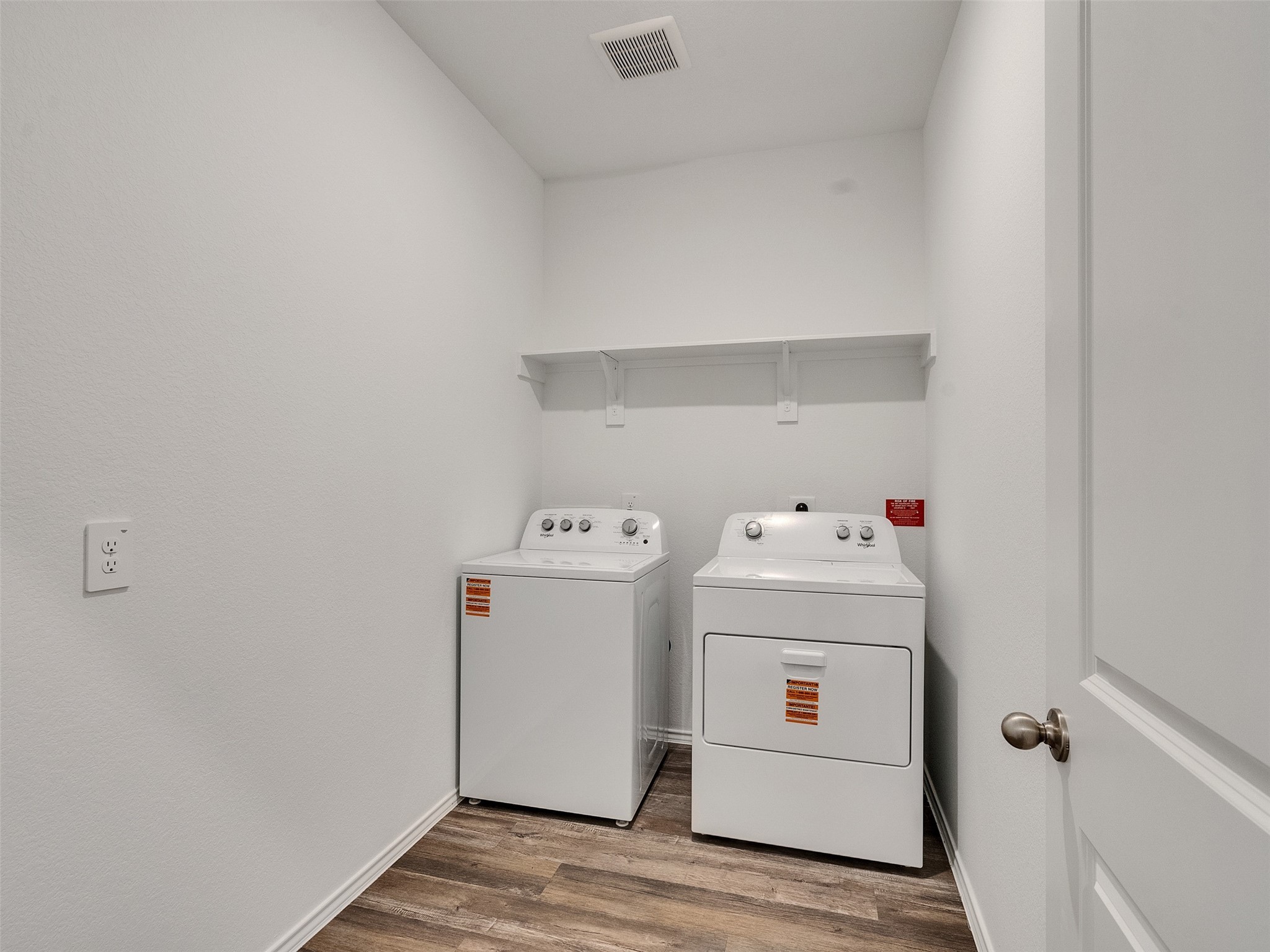 24863 Springbluff Valley Magnolia, TX 77355 - Photo 5 of 25 a utility room with dryer and washer