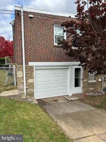 a view of a house with a garage