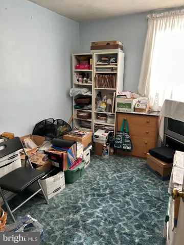 a view of a workspace with furniture