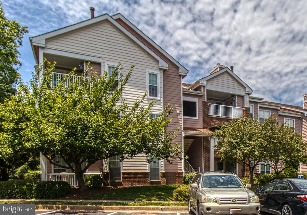 21024 Timber Ridge Terrace, Unit 303 Ashburn, VA 20147 - Photo 1 of 42 Top Floor Condo With View Of Trees