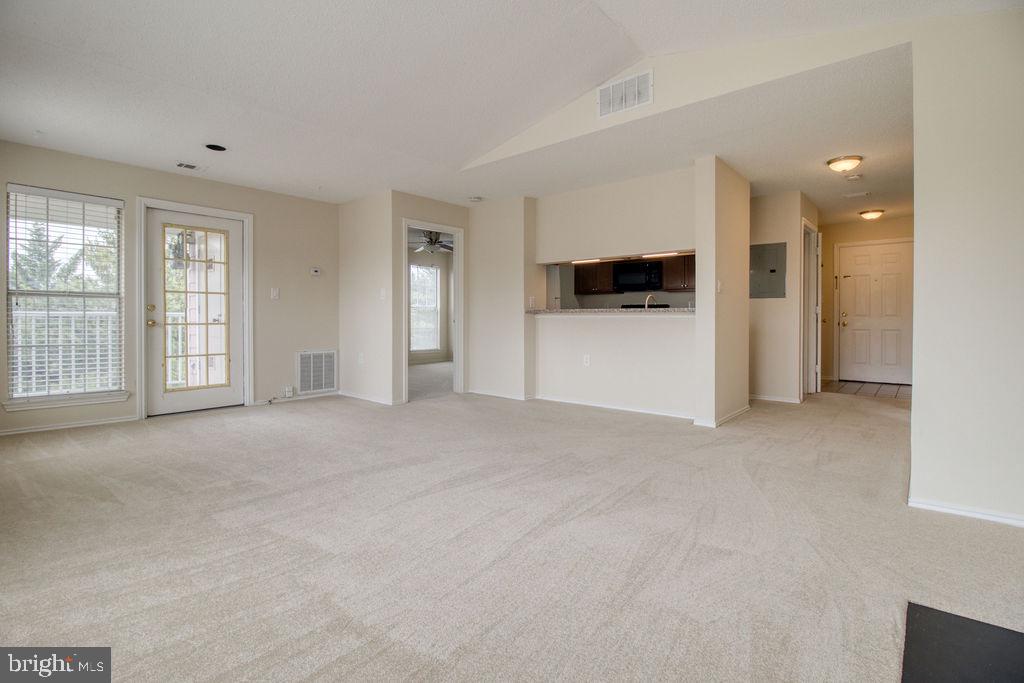21024 Timber Ridge Terrace, Unit 303 Ashburn, VA 20147 - Photo 15 of 42 Living Room View To Master Bedroom