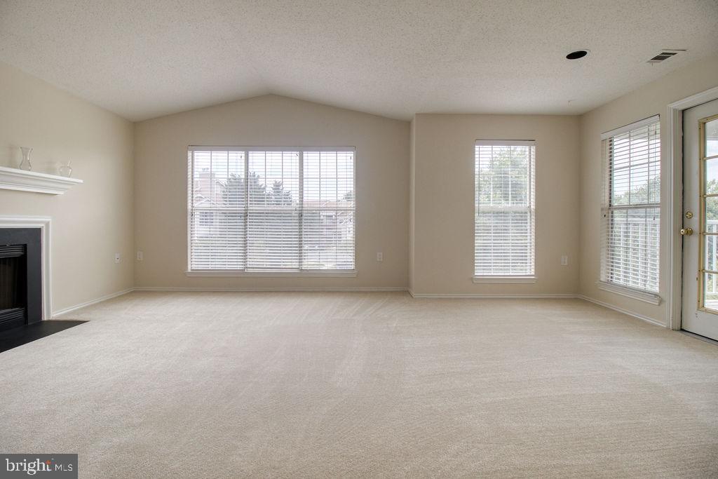 21024 Timber Ridge Terrace, Unit 303 Ashburn, VA 20147 - Photo 17 of 42 Spacious And Bright Living Room